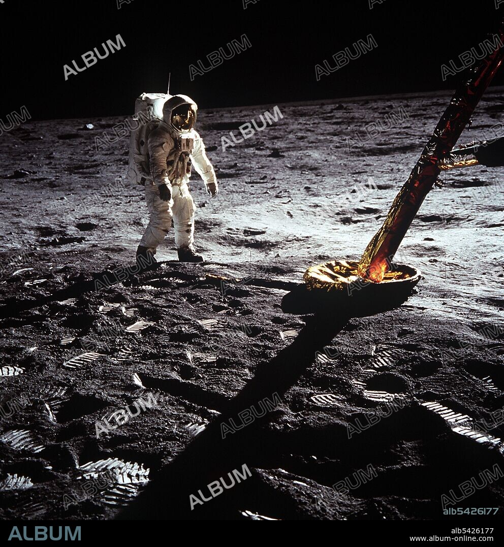 Buzz Aldrin by the leg of the Lunar Module, Apollo II mission, July 1969. Astronaut Buzz Aldrin walking on the lunar surface, by the footpad of the Lunar Module. The Apollo 11 Lunar Module, code named Eagle, with US astronauts Neil Armstrong and Buzz Aldrin on board, landed in the Sea of Tranquillity on 20 July 1969. Apollo 11 was the fifth manned Apollo mission, and was the first to land on the Moon.