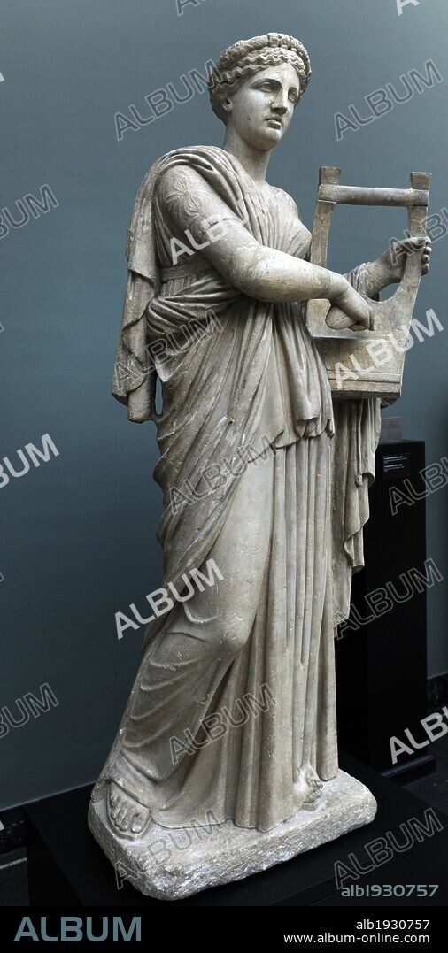 Classical mythology. Erato. Muse of lyric poetry. Roman statue. 2nd century AD. The muse is depicted playing the zither or lyre. From Monte Calvo, Italy. Ny Carlsberg Glyptotek. Copenhagen, Denmark.