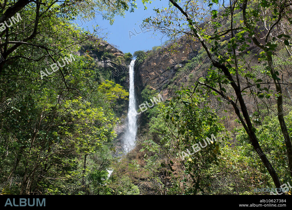 Itiquira waterfall (salto do Itiquira) (168m high) in Brazilian Highlands, Goias State, Brazil. Rio Itiquira is a tributary of Rio Parana , in Rio Tocantins basin.