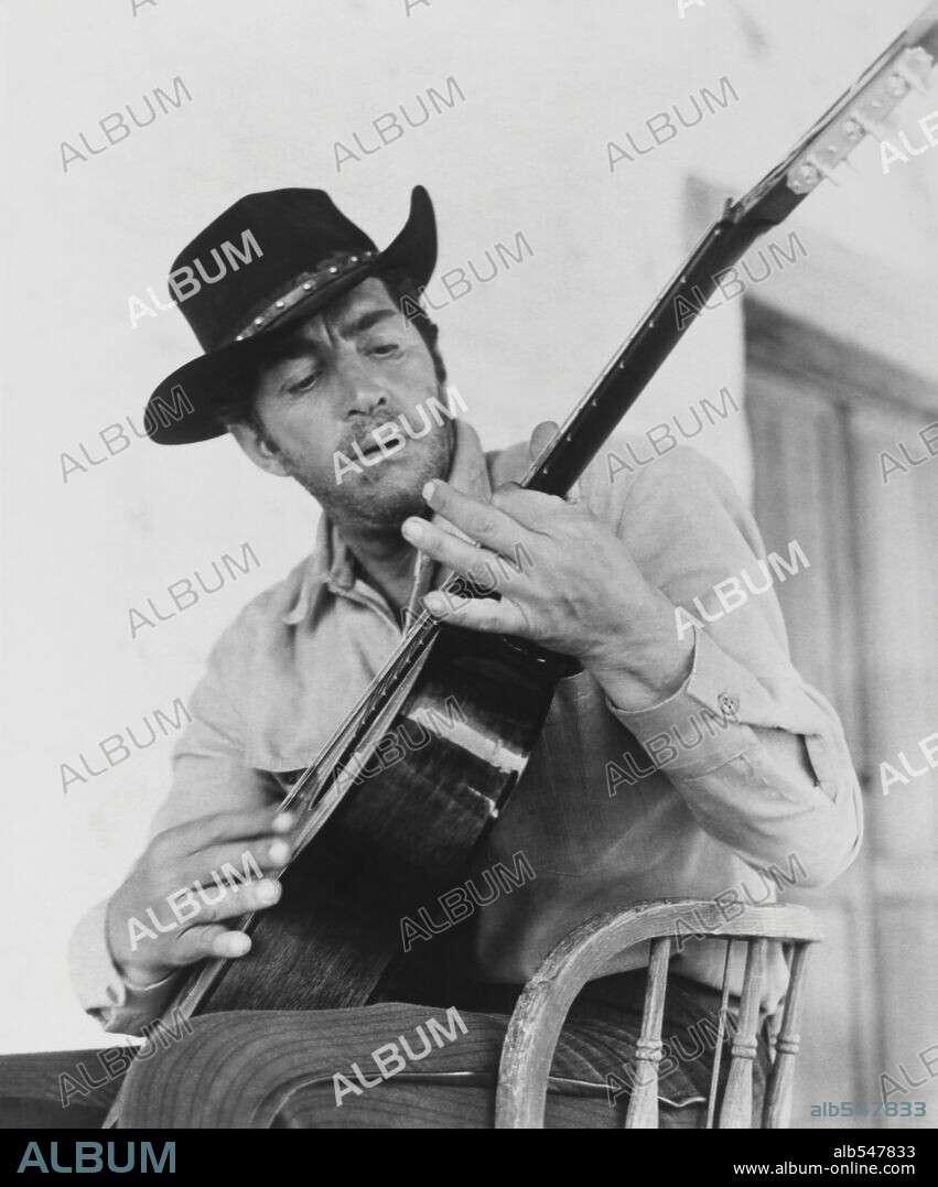 DEAN MARTIN in THE SONS OF KATIE ELDER, 1965, directed by HENRY HATHAWAY. Copyright PARAMOUNT PICTURES.