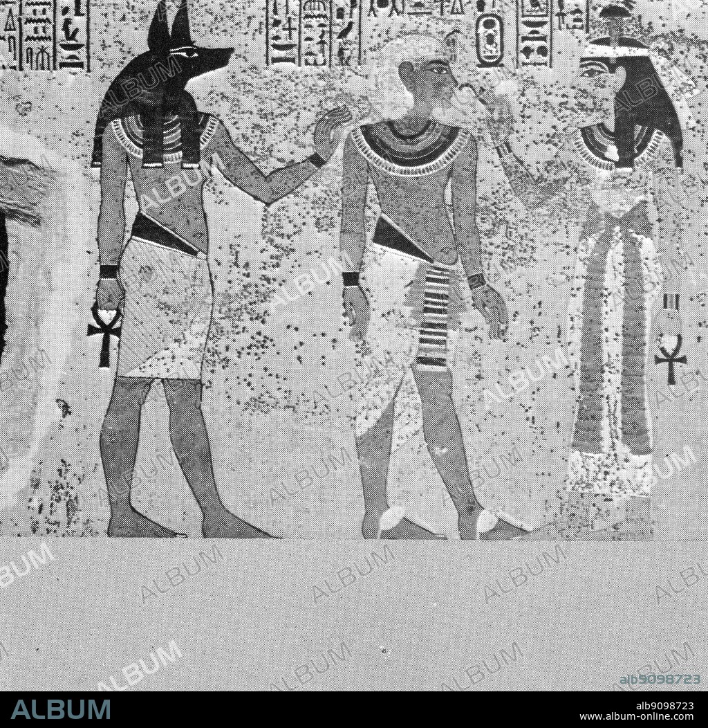 Wall paintings on the south wall of Tuutankhamen's tomb. Hathor holds the symbol of life to the nostril of Tutankhamun. The Treasures of Tutankhamen, The Exhibition Catalogue by I E S Edwards, page 45.