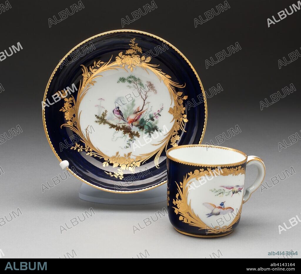 MANUFACTURE DE PORCELAINE DE VINCENNES. Cup and Saucer. Vincennes Porcelain Manufactory; French, founded 1740 (known as Sevres from 1756); Painted by Yvernel (attributed to) (French, active 1750-58). Date: 1752-1753. Dimensions: Cup: 6.4 x 7.1 cm (2 1/8 x 3 3/4 in.); Saucer: 3.8 x 15.2 cm (1 1/2 x 6 in.). Soft-paste porcelain, underglaze blue ground, polychrome enamels, and gilding. Origin: Vincennes.