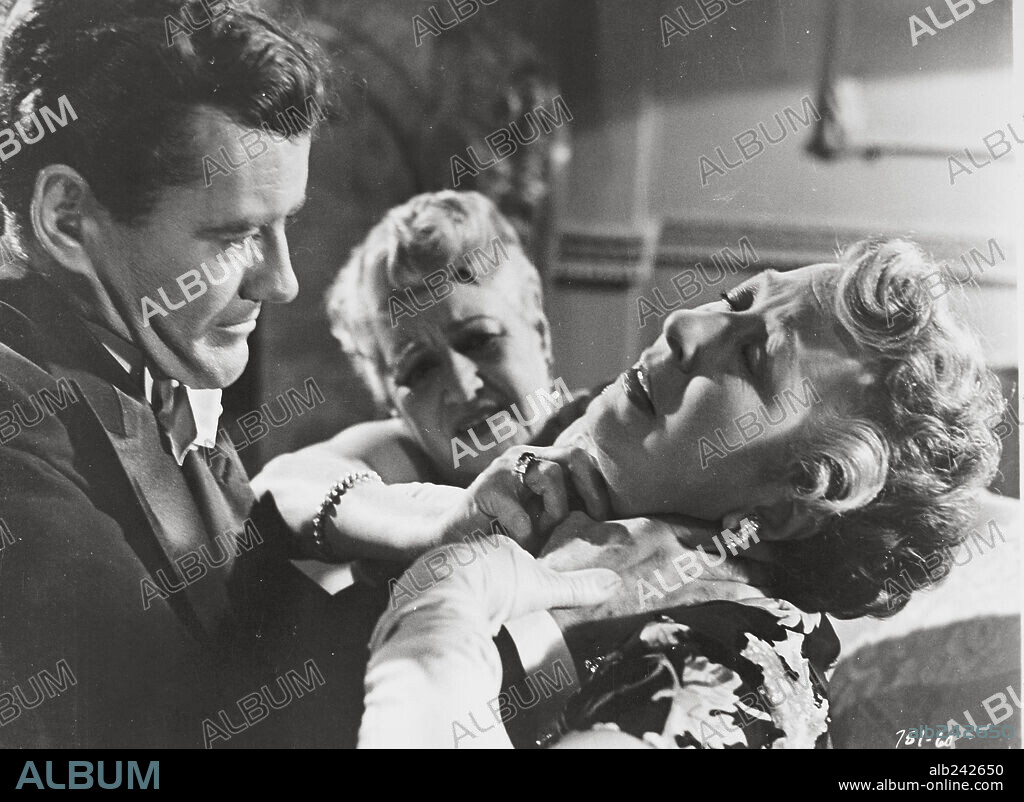 ROBERT WALKER en EXTRAÑOS EN UN TREN, 1951 (STRANGERS ON A TRAIN), dirigida por ALFRED HITCHCOCK. Copyright WARNER BROTHERS.