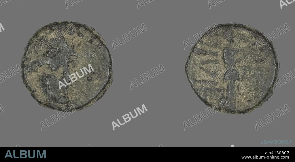 ANCIENT GREEK. Coin Depicting the Goddess Athena. Greek. Date: 100 BC-1 AD. Dimensions: Diam. 1.2 cm; 1.89 g. Bronze. Origin: Ancient Greece.