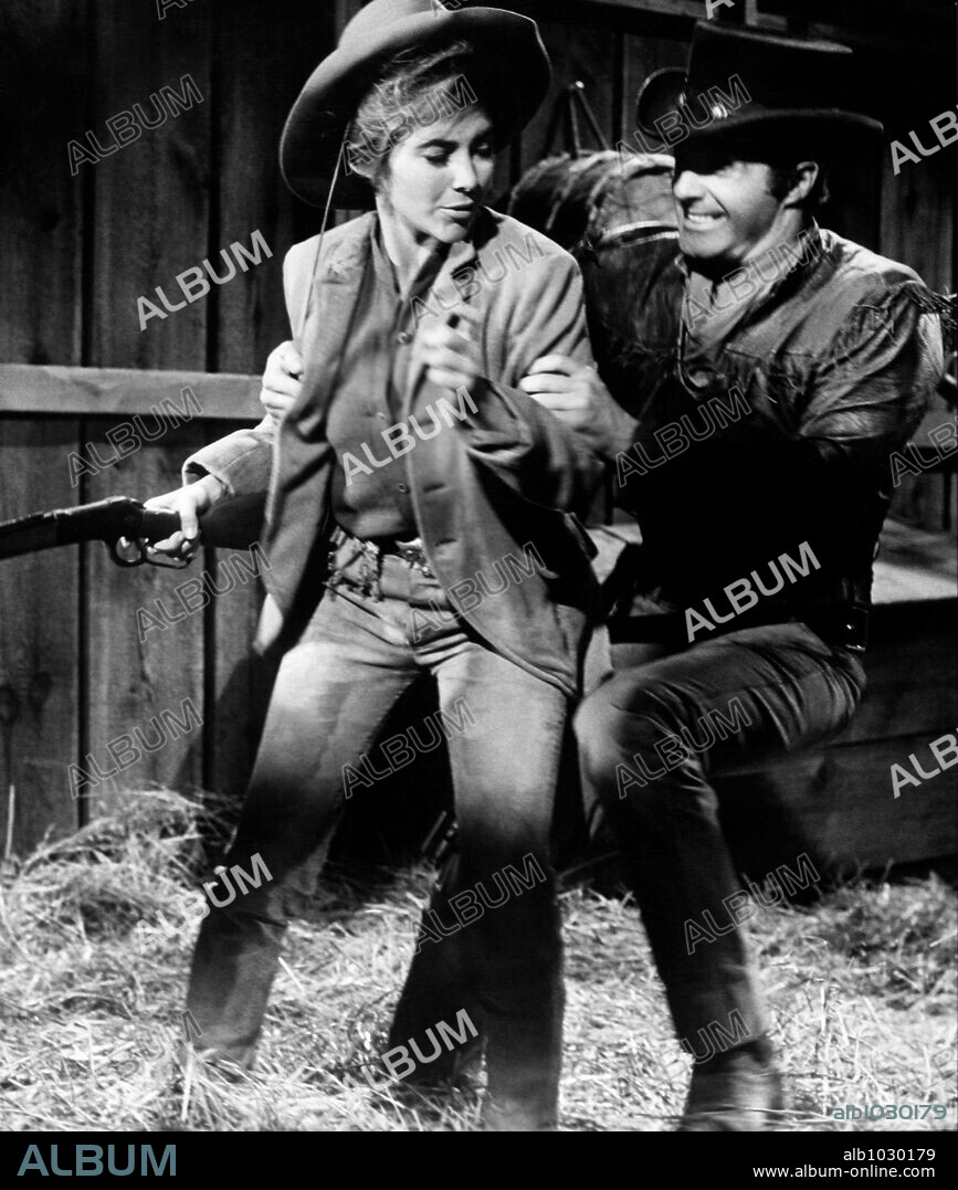 JAMES CAAN und MICHELE CAREY in EL DORADO, 1966, unter der Regie von HOWARD HAWKS. Copyright PARAMOUNT PICTURES.