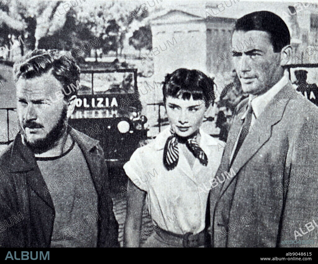 Film still of Audrey Hepburn (1929-1993), Eddie Albert (1906-2005) and Gregory Peck (1906-2005) from 'Roman Holiday'.