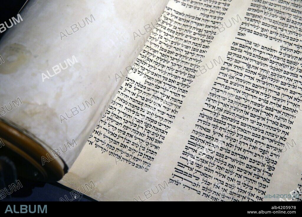 Jewish Museum of Switzerland. Basel. Old Torah scroll with Hebrew writing. Close-up.