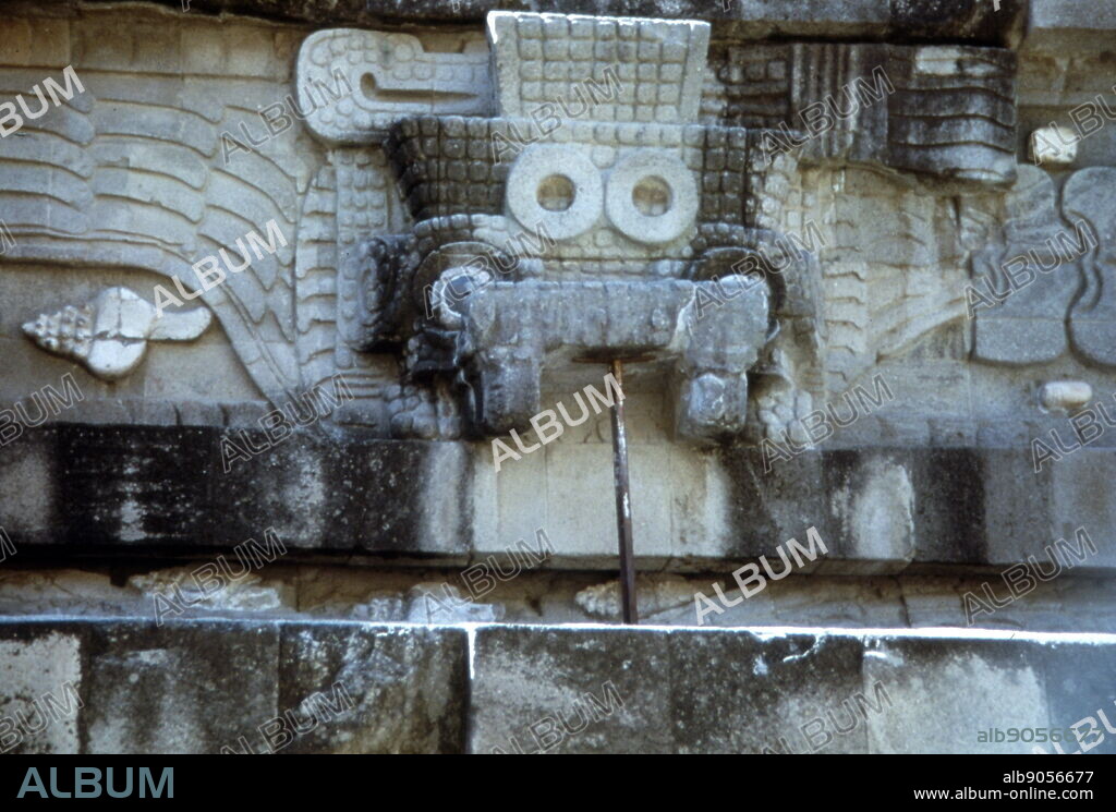 Mask of Tlaloc part of a sculpted frieze at the Temple of the Feathered Serpent, pyramid, Teotihuacan, a pre-Columbian site in central Mexico. The pyramid takes its name from representations of the Mesoamerican "feathered serpent" deity which covered its sides. The structure is also known as the Temple of Quetzalcoatl, and the Feathered Serpent Pyramid. the structure, are dated to between 150 and 200 CE. Tlaloc was a member of the pantheon of gods in Aztec religion.