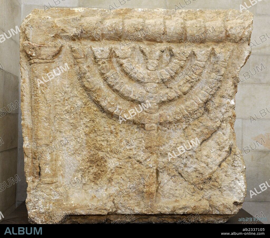 Stone lintels decorated with the Seven-Branched Menorah synagogue at Eshtemoa. Southern Hebron hill region. 3rd-4th century CE. Rockefeller Archaeological Museum. Jerusalem. Israel.