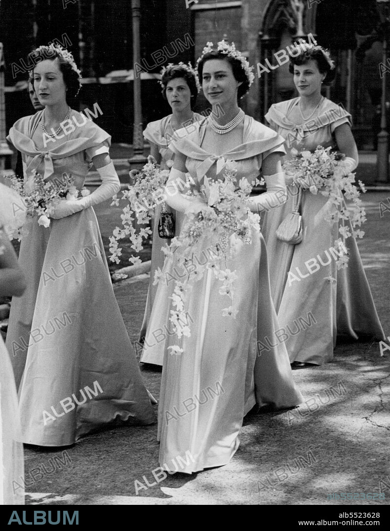 Princess Margaret A Bridesmaid At Wedding Of Queen's Niece -- The bridesmaids, in orchid pink with white bouquets. On right is Princess Margaret and left Miss Diana Bowes-Lyon.At rear are, left, Miss Jeannine Bridgeman and Miss Marigold Bridgeman.Princess Margaret was one of four bridesmaids at today's wedding at St. Margaret's Westminster, London, of the Queen's niece, the Hon Margaret Elphinestone, daughter of Lord and Lady Elphinestone.The bridegroom was Mr. Denys Rhodes, elder son of the late Major Tahu Rhodes and Mrs. Helen Rhodes. July 31, 1950. (Photo by Paul Popper Ltd.).