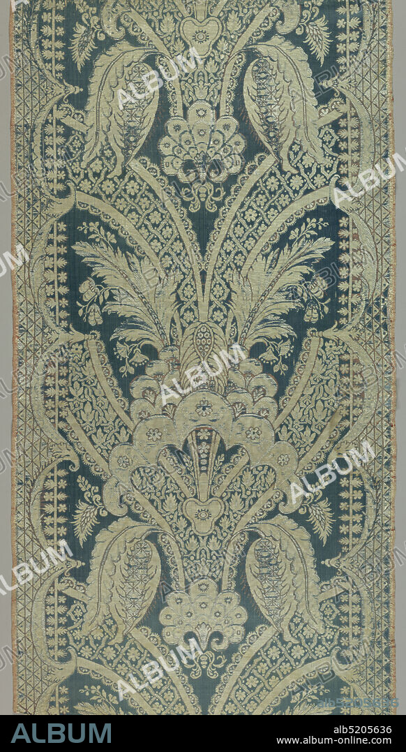 Textile, Medium: silk Technique: 7&1 satin (blue) patterned by floats of weft from every second shed (white) bound by a supplementary warp (white) in plain weave and by floats of complementary wefts in every second shed (white and red) bound on the front as 1/3 twill, Panel of light blue and white silk with light red details. Pattern shows large scale, symmetrical repeat; fan-shaped with large leaves and branching bands. Both selvages present. Repeat 0M660 long., France, early 18th century, woven textiles, Textile.