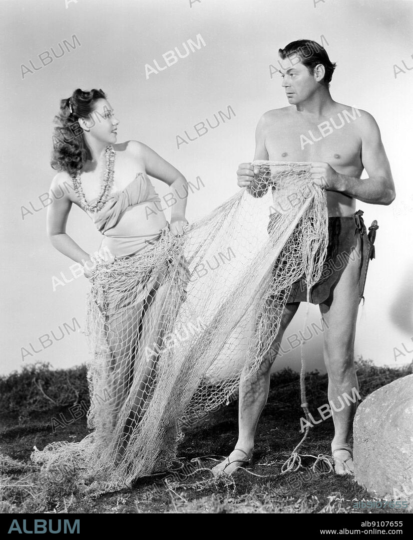 JOHNNY WEISSMULLER and LINDA CHRISTIAN in TARZAN AND THE MERMAIDS, 1948, directed by ROBERT FLOREY. Copyright RKO.