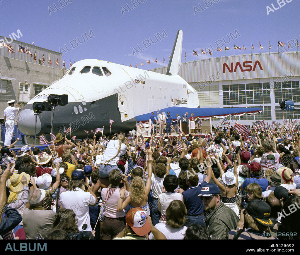 President Reagan at STS-4 landing, California, USA, 1982. US President Ronald Reagan greets the crew of STS-4 (Thomas K. Mattingly II and Henry W. Hertsfield Jr) at the Dryden Flight Research Center (now the Armstrong Flight Research Center). The crew flew on Space Shuttle Columbia, but the public welcome event was held in front of Shuttle Enterprise. The NASA Logotype (also known as the "Worm") is prominently displayed on the hangar in the background.