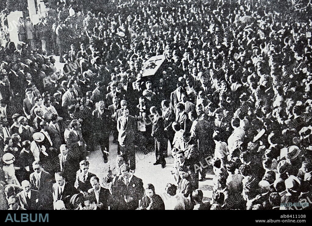Funeral in Madrid in 1936 of Jose Calvo Sotelo, 1st Duke of Calvo Sotelo, GE (6 May 1893 - 13 July 1936) was a Spanish jurist and politician, minister of Finance during the dictatorship of Miguel Primo de Rivera and a leading figure during the Second Republic. During this period he became an important part of Renovacion Espanola, a monarchist movement. His assassination in July 1936 by the bodyguard of Socialist party leader Indalecio Prieto was an immediate prelude to the triggering of the military coup plotted since February 1936, the partial failure of which marked the beginning of the Spanish Civil War.