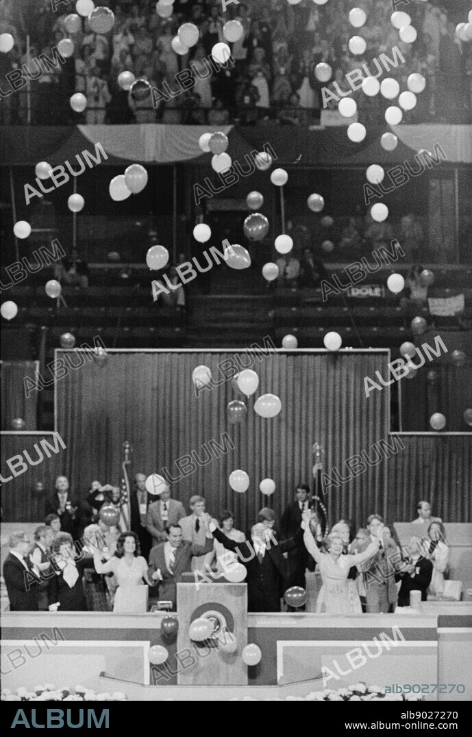 Photograph of President Gerald Ford, First Lady Betty Ford, Senator Bob Dole and Elizabeth Dole celebrate winning the nomination amidst floating balloons at the Republican National Convention. Photographed by John T. Bledsoe. Dated 1976.