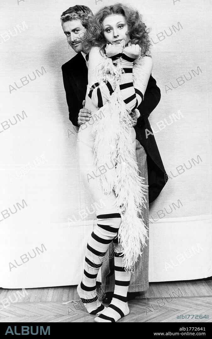 Lia Tanzi with her husband Giuseppe Pambieri. The Italian actors Lia Tanzi and Giuseppe Pambieri posing in the costumes of the comedy 'Sigismondo' directed by Pasquale Festa Campanile at the Teatro Nuovo. Milan, 1976.