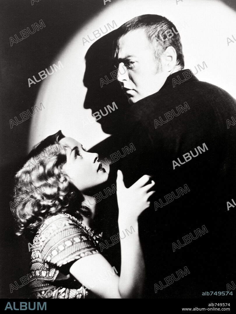 MARIAN MARSH and PETER LORRE in CRIME AND PUNISHMENT, 1935, directed by PIERRE CHENAL. Copyright COLUMBIA PICTURES.
