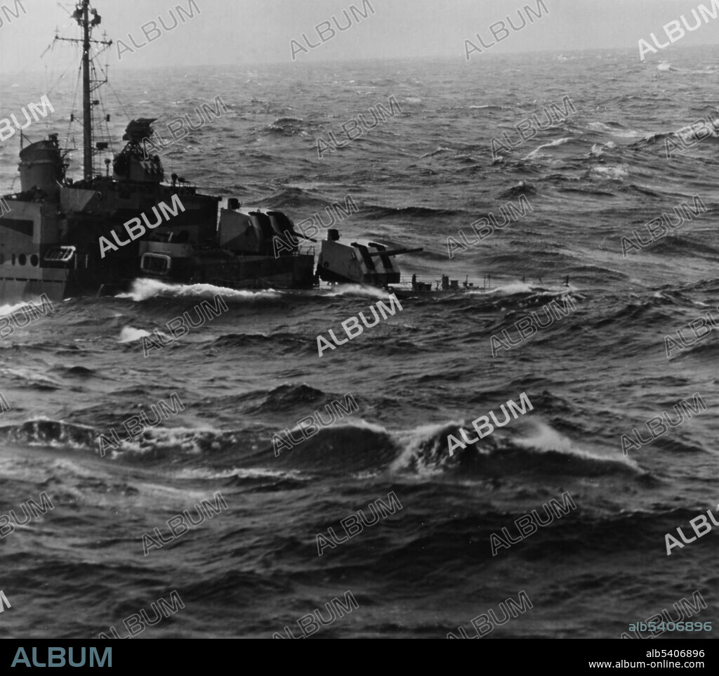Unidentified Destroyer. Typhoon Cobra was a powerful tropical cyclone that struck the US Pacific Fleet during WWII. The information given to Admiral Halsey about the location and direction of the typhoon was inaccurate. On December 17, 1944, Halsey unwittingly sailed the Third Fleet into the center of the typhoon. Because of 100 mph winds, high seas, and torrential rain, three destroyers capsized and sank with 790 lives lost. Nine other warships were damaged, and over 100 aircraft were wrecked or washed overboard. (cropped and cleaned).