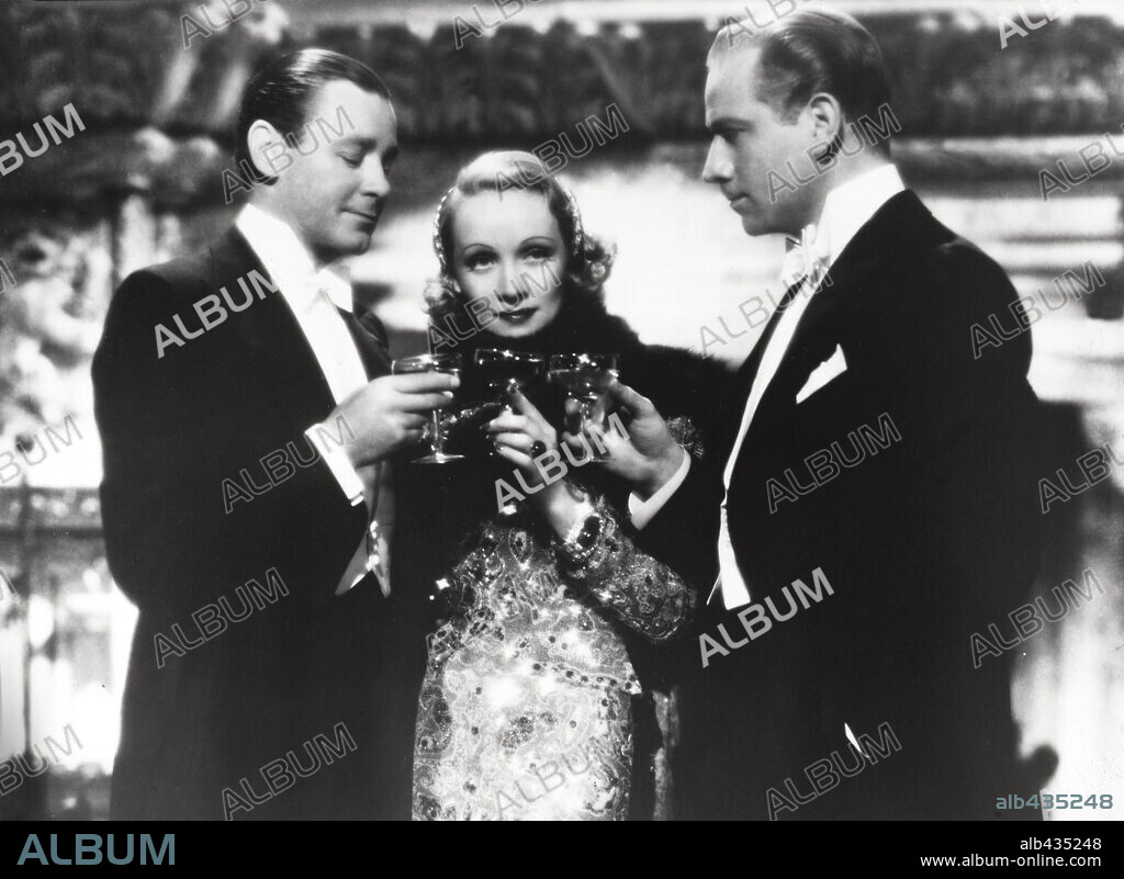 HERBERT MARSHALL, MARLENE DIETRICH and MELVYN DOUGLAS in ANGEL, 1937, directed by ERNST LUBITSCH. Copyright PARAMOUNT PICTURES.