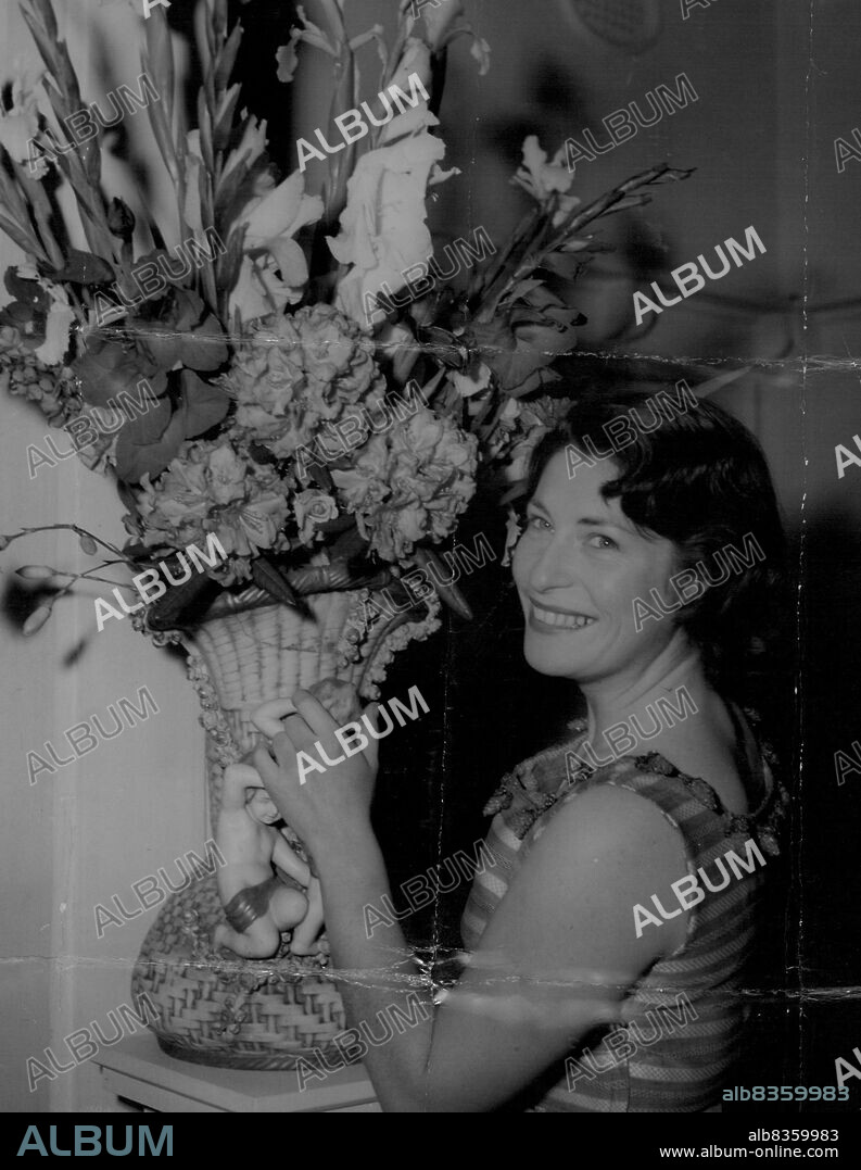 This is Madge Stephens, the Geelong girl, who stole the show at "Kismet" at the Princess Theatre last night.Twenty-three-year-old Madge sipped black coffee today after a long sleep-in and said: "I lay awake last night for hours thinking ... it can't be me! It must be someone else."More than 1700 people heard her sing Marsinah, the sweet, innocent, young daughter of the beggar, Hajj-but Madge was thinking of someone who wasn't in the audience. "I was wonderfully happy for my mother." she said. October 14, 1955.