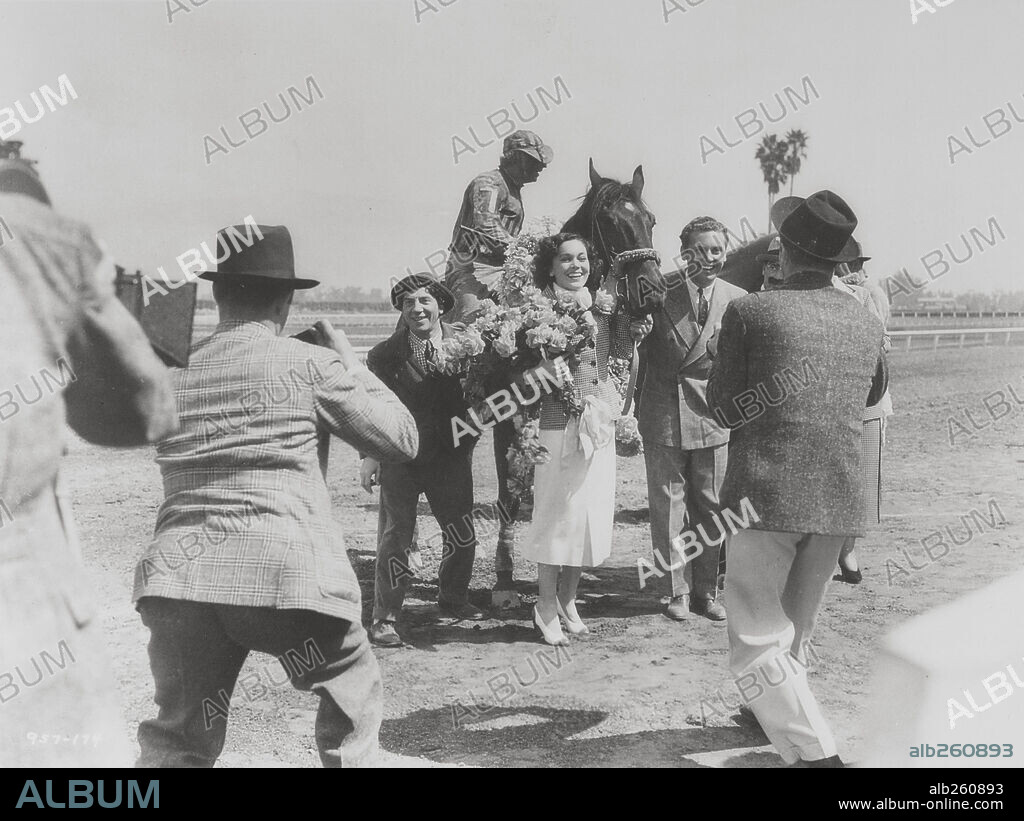 ALLAN JONES, CHICO MARX and MAUREEN O'SULLIVAN in A DAY AT THE RACES, 1937, directed by SAM WOOD. Copyright M.G.M.