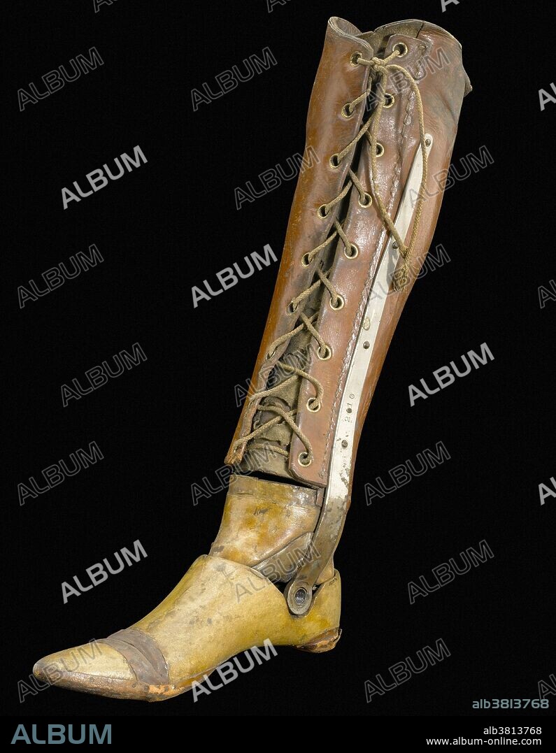 Artificial right leg, Europe, 1891-1930. This artificial leg looks like a leather boot laced to the knee. It was designed for someone who had their right foot amputated just above the ankle joint. The wooden foot and ankle are jointed and can bend. The remains of the lower leg are supported by the strong steel bar.