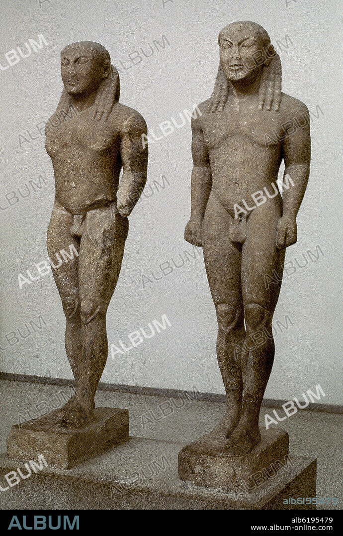 Statues of Kleobis and Biton, standing like kouros.. Greece, archaeological museum of Delphi.