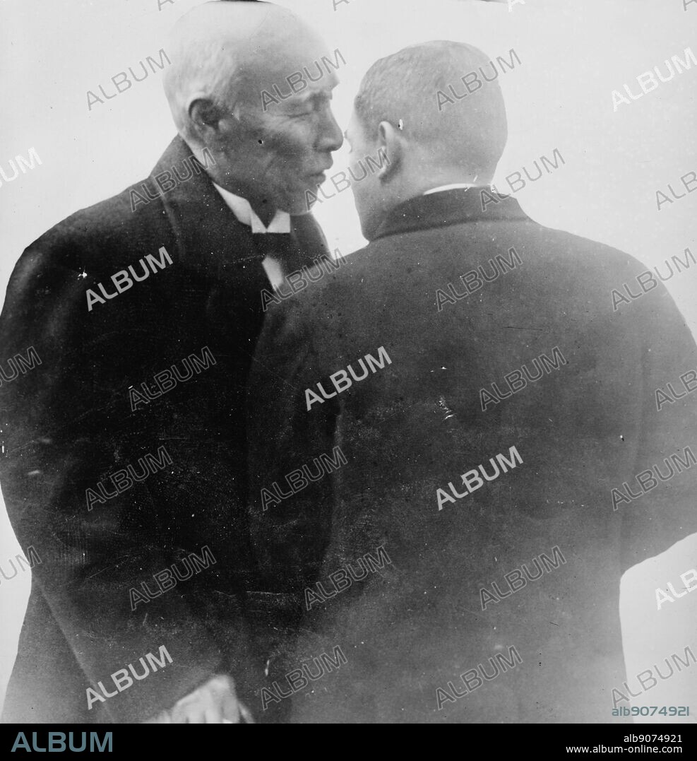 Okuma Shigenobu (1838-1922), who served as Prime Minister of Japan (1914-1916) with diplomat Viscount Ishii Kikujiro (1866-1945).