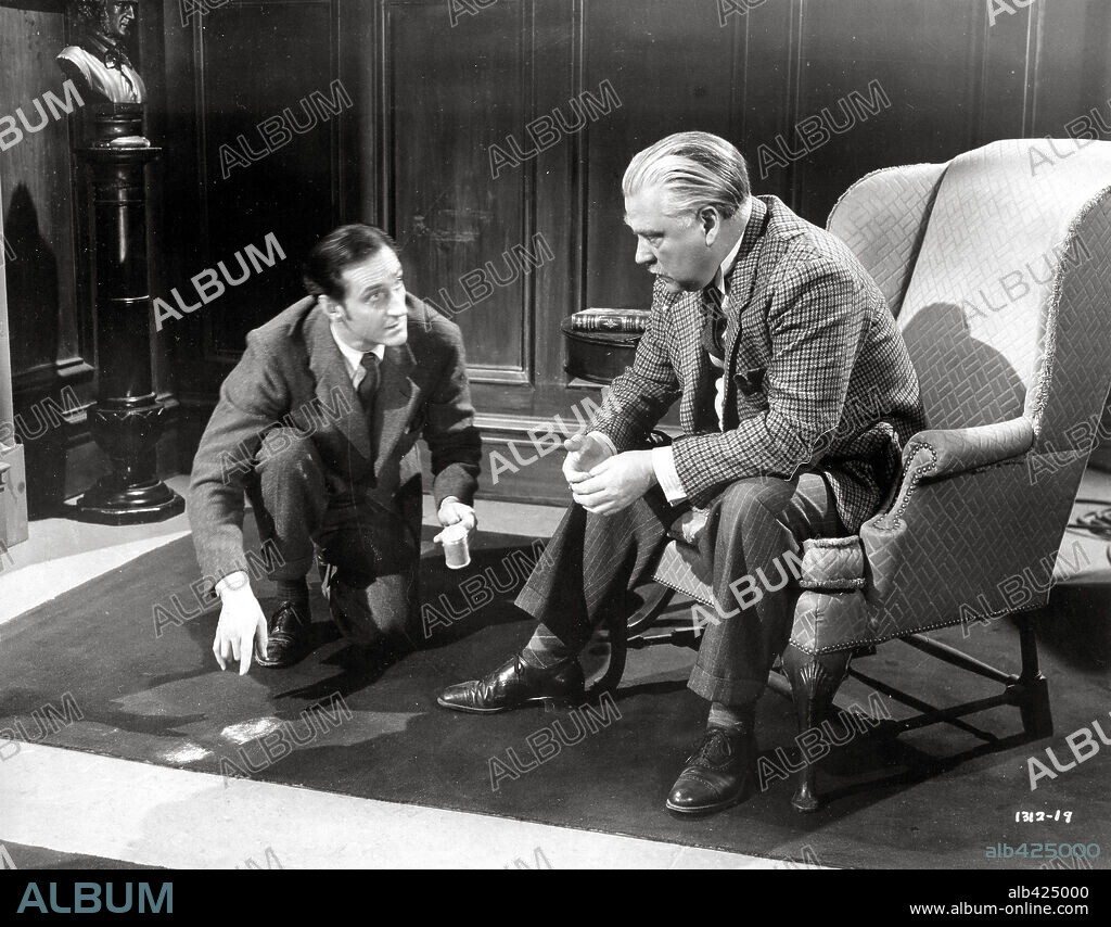 BASIL RATHBONE and NIGEL BRUCE in SHERLOCK HOLMES FACES DEATH, 1943, directed by ROY WILLIAM NEILL. Copyright UNIVERSAL PICTURES.