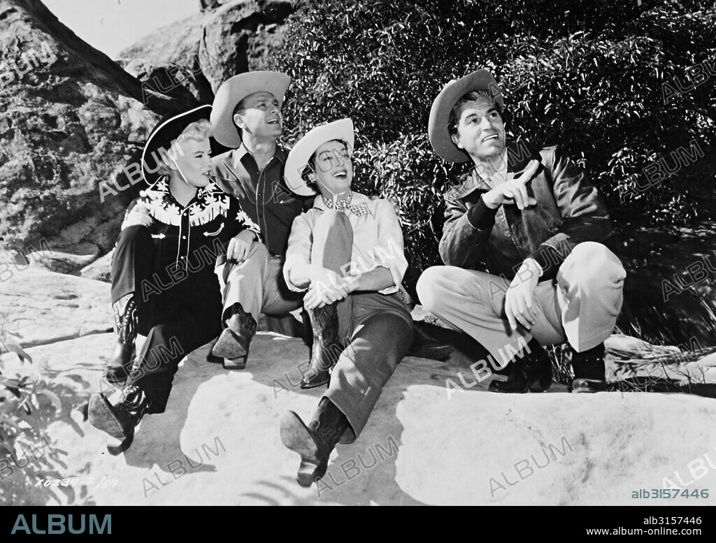 EDDIE ALBERT, FERNANDO LAMAS, GLORIA DEHAVEN and ROSALIND RUSSELL in THE GIRL RUSH, 1955. Copyright PARAMOUNT PICTURES.