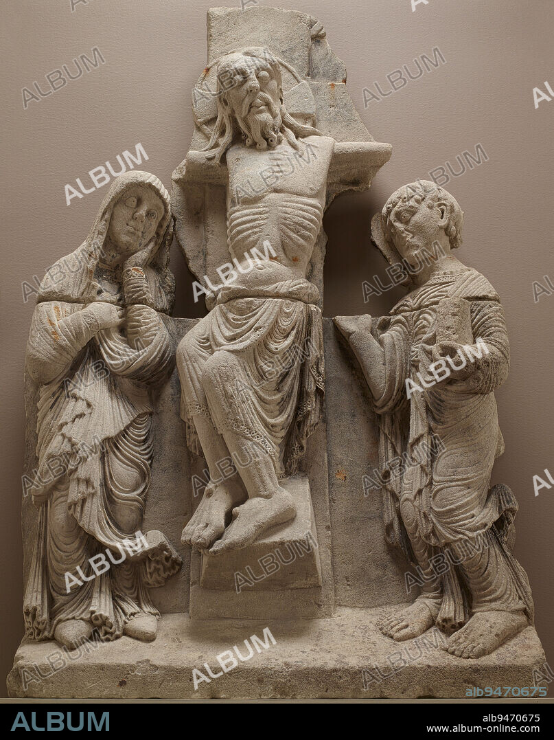 Crucifixion, c. 1180, 60 5/8 x 38 9/16 x 7 7/8 in. (154 x 98 x 20 cm.), Limestone, Spain, 12th century, Jesus is seen dead on the cross while his mother, Mary, and his favorite disciple, the Evangelist Saint John, mourn below. This large-scale work embodies the characteristics of Romanesque sculpture in the medieval period, with its heavy stylized bodies, calligraphic depiction of hair, and linear, energetic approach to rendering the folds of the fabric.