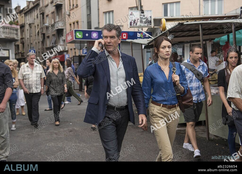 OLGA KURYLENKO and PIERCE BROSNAN in THE NOVEMBER MAN, 2014, directed by ROGER DONALDSON. Copyright DAS FILMS.