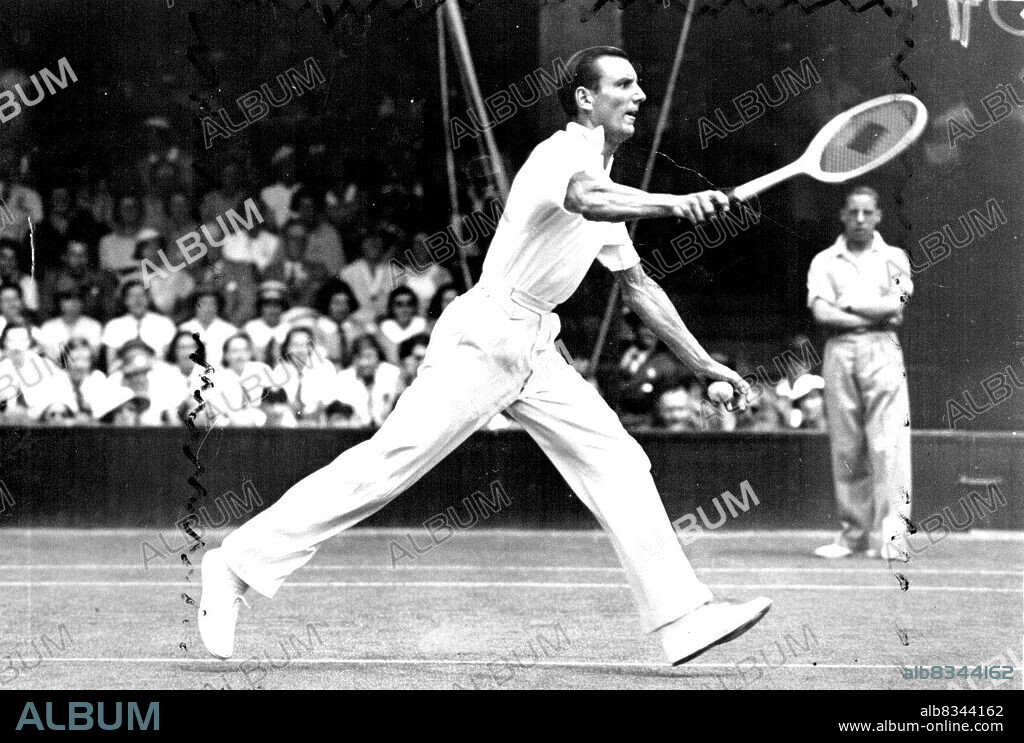 All England Lawn Tennis Championships At Wimbledon.F. J. Perry champion in play during his ***** K. Chartikavanij (Siam) in the ***** of the Men's Singles Championship.Fred Perry, a former champion, who thinks he could have beaten the modern net-rushers. July 27, 1936.