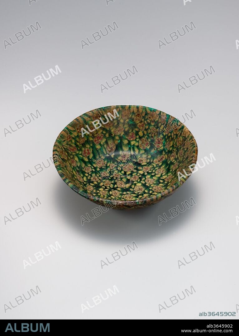 Glass Bowl in Millefiori Technique. Dimensions: H. 2 in. (5.1 cm)
Diam. of rim: 5 5/8 in. (14.3 cm). Date: 9th century.
The millefiori technique was rediscovered in the eighth or ninth century in Mesopotamia and was probably used in the production of objects for the 'Abbasid caliphs in Baghdad or Samarra. A number of surviving bowls and tiles suggest that it was used both for domestic furnishings and interior decoration. Examples such as these show the sophistication and range of Abbasid glassmakers.