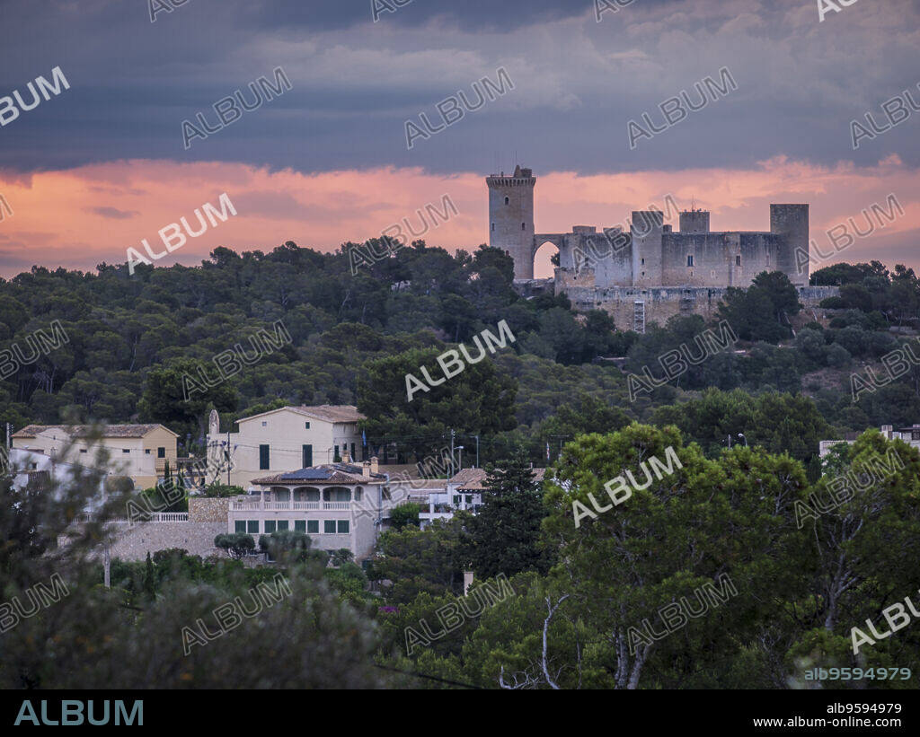 Bellver castle at dawn, seen from the town of Genova, Mallorca, Spain.