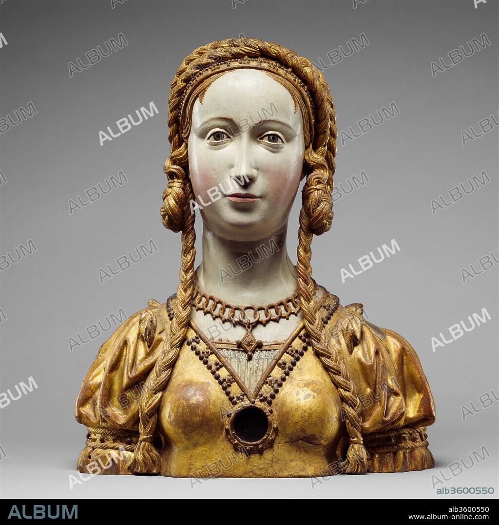 Reliquary bust of a companion of Saint Ursula. Culture: Belgian, possibly Brussels. Dimensions: Height: 17 7/8 in. (45.4 cm). Date: ca. 1520-30.
This piece is one of twenty-three related reliquary busts, many of which have a Spanish provenance. In addition to the compartment visible on the saint's chest, a hinged opening at the top of her head gives access to another relic container.
Although long believed to be Spanish, this series of busts is closer in style to the work of sculptors from the sourthern Lowlands (Brabant or possibly Brussels), whose influence on Spanish sculpture in the late Gothic period was profound. Some examples may well have been carved in Spain by Brabantine artists who migrated to Spain during this period of close political and artistic relations at the end of the fifteenth and in the early sixteenth century. Another possible explanation is that the Hapsburg emperor Charles V donated the pieces to  Spanish churches, or that Spanish officials at his court in Brussels acquired the pieces and brought them back to Spain.