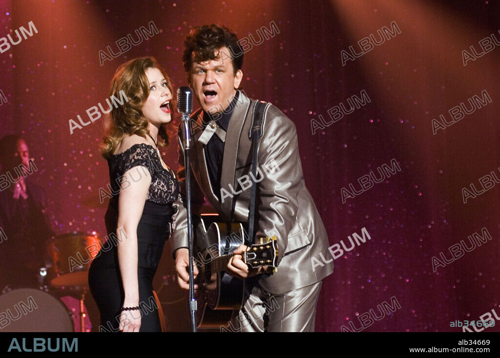 JENNA FISCHER and JOHN C. REILLY in WALK HARD: THE DEWEY COX STORY, 2007, directed by JAKE KASDAN. Copyright APATOW PROD./COLUMBIA PICT./GH THREE/NOMINATED FILMS.