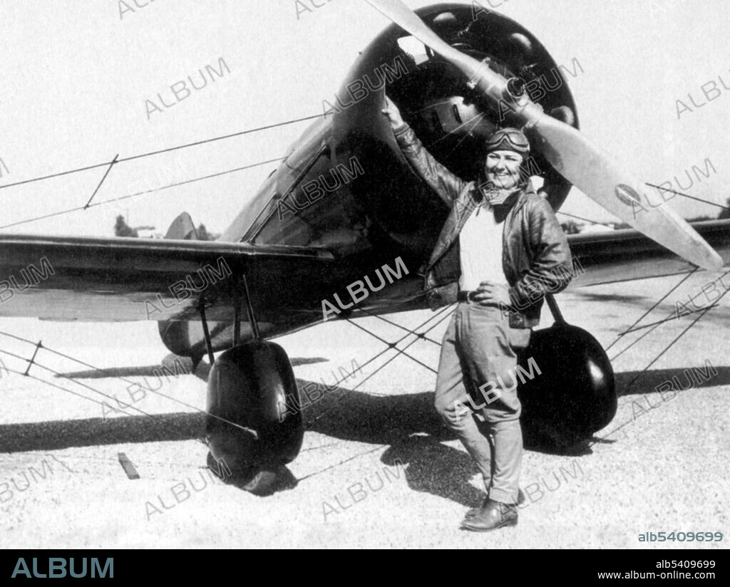 Barnes posing with her Type R Mystery Ship, a wire-braced, low-wing racing airplane built by the Travel Air company in the late 1920s and early 1930s. Florence Lowe (Pancho) Barnes (July 22, 1901 - March 30, 1975) was a pioneer aviator, the founder of the first movie stunt pilots' union. In 1930, she broke Amelia Earhart's air speed record. Barnes raced in the Women's Air Derby and was a member of the Ninety-Nines. In later years, she was known as the owner of the Happy Bottom Riding Club, a bar and restaurant in the Mojave Desert, Southern California, catering to the legendary test pilots and aviators who worked nearby. No photographer credited, undated (cropped and cleaned).