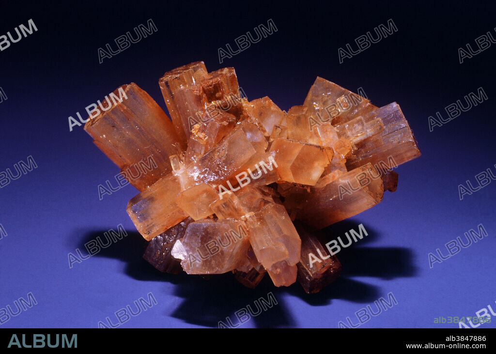 Aragonite and calcite are both composed of calcium carbonate, but the two minerals have different crystallographic structures. Aragonite is the substance of pearls, while calcite typically makes up the shells of mollusks. Aragonite is extremely common and widespread, and forms very attractive crystals that are often grown together in forms known as twins. Twinning in crystals may result in forms with symmetry that appears different from that of individual crystals. This is evident in the material from Tazouta, Morocco.