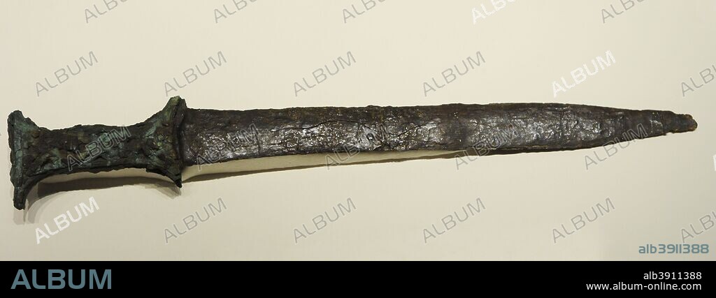 Sword with iron blade and bronze knob. Iron Age I. Late Urnfields Culture. 6th century BC. Tossal de los Regallos (Candasnos, province of Huesca, Aragon), Spain. National Archaeological Museum. Madrid. Spain.