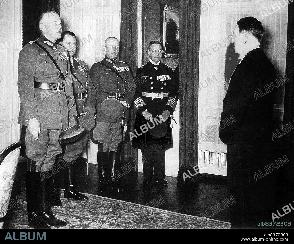 Adolf Hitler (Führer und Reichskanzler) officially received congratulations from officials of the army in the new year celebration event held in Berlin, the night of 31 December 1935-1 January 1936.<br/><br/>. From left to right: Generaloberst Werner von Blomberg (Reichskriegsminister und Oberbefehlshaber der Wehrmacht), General der Flieger Hermann Göring (Oberbefehlshaber der Luftwaffe), General der Artillerie Werner Freiherr von Fritsch (Oberbefehlshaber des Heeres), and Admiral Erich Raeder (Oberbefehlshaber der Kriegsmarine).