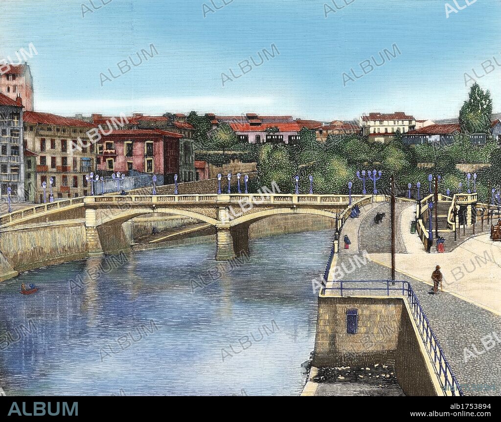HISTORIA DE ESPAÑA. PAIS VASCO. BILBAO. PUENTE DE LA MERCED, sobre la Ría. Grabado de la "Ilustración Nacional" (1887). Coloreado.