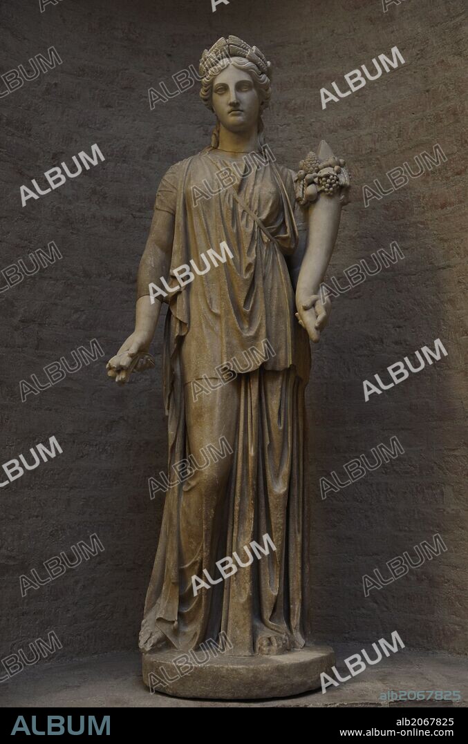 Artemis. Goddes of the Hunt. Daughter of Zeus and sister of Apollo. Roman equivalent is Diana. The ancient torso (roman sculpture after an Artemis statue of the 4th century BC) was restored by Bertel Thorvaldsen as Ceres, goddess or fertility.