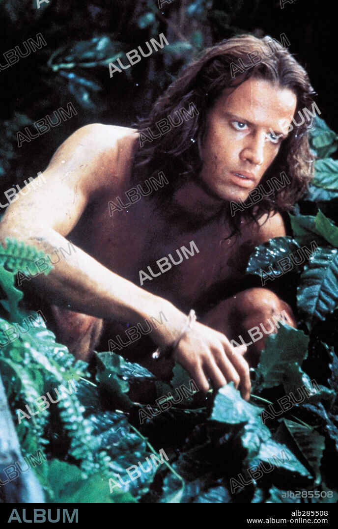 CHRISTOPHER LAMBERT en GREYSTOKE, LA LEYENDA DE TARZAN EL REY DE LOS MONOS, 1984 (GREYSTOKE: THE LEGEND OF TARZAN, LORD OF THE APES), dirigida por HUGH HUDSON. Copyright WARNER BROTHERS.