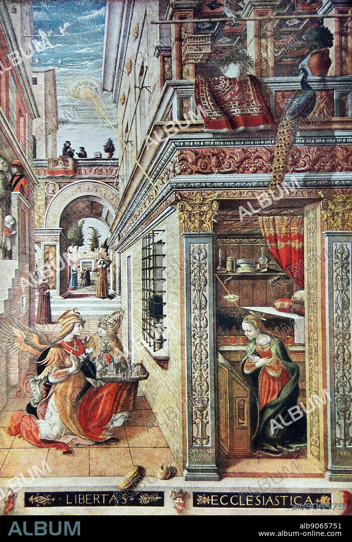 The Annunciation with St Emidius. The painting depicts the Archangel kneeling in an open courtyard announcing to the Virgin that she shall be the Mother of Christ. By Carlo Crivelli (1435 - 1495) Italian painter through the Renaissance and Gothic Art periods. Dated 1486.