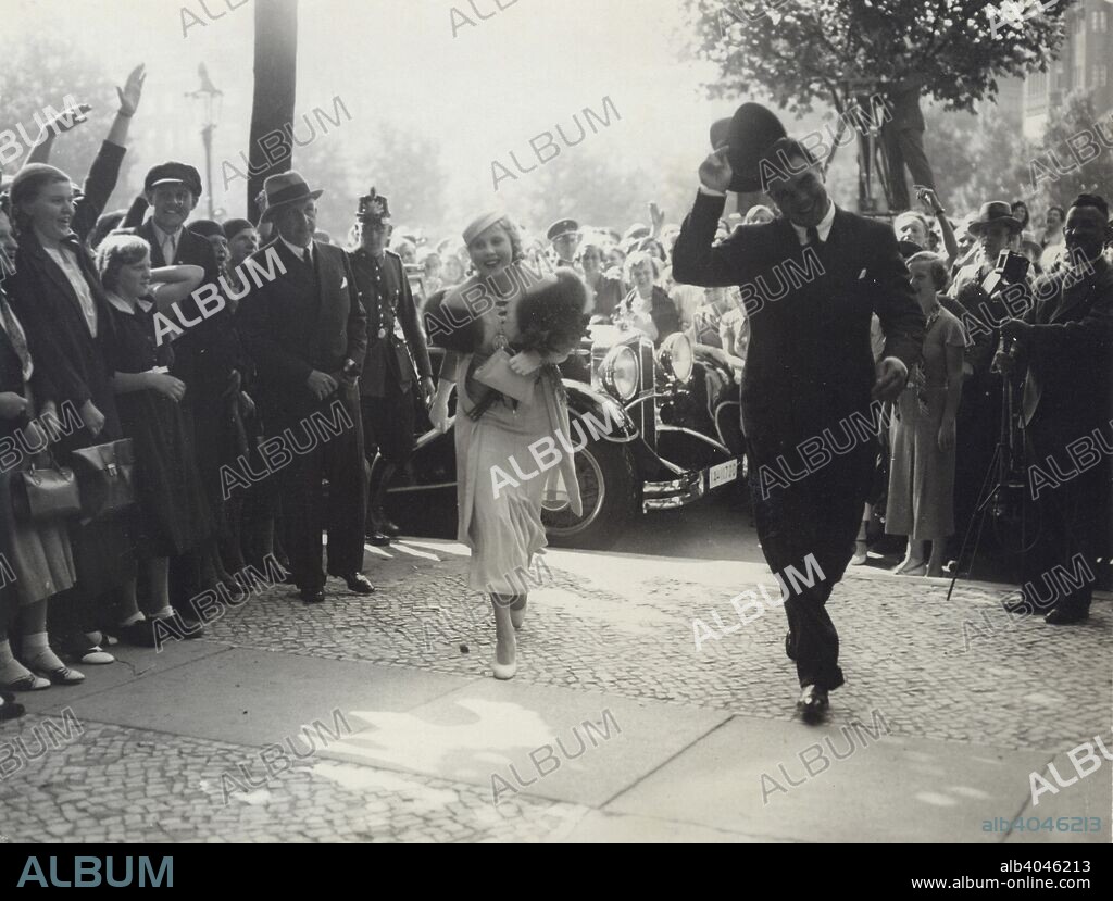 Max Schmeling and Anny Ondra arrive at the registry office to be married, 1933. Czech film actress Anny Ondra (1903-1987) and German boxer Max Schmeling (1905-2005) married on 6 July 1933. They remained happily married until her death in 1987. Schmeling is best remembered for his two world heavyweight championship fights against Joe Louis in the late 1930s.
