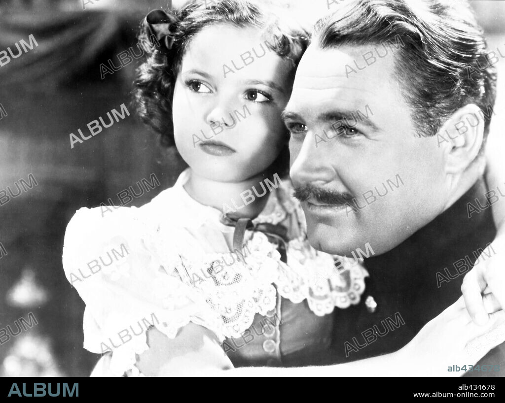 IAN HUNTER and SHIRLEY TEMPLE in THE LITTLE PRINCESS, 1939, directed by WALTER LANG. Copyright 20TH CENTURY FOX.