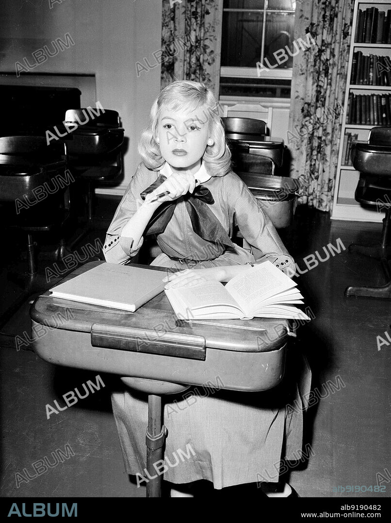 SANDRA DEE in UNTIL THEY SAIL, 1957, directed by ROBERT WISE. Copyright M.G.M.