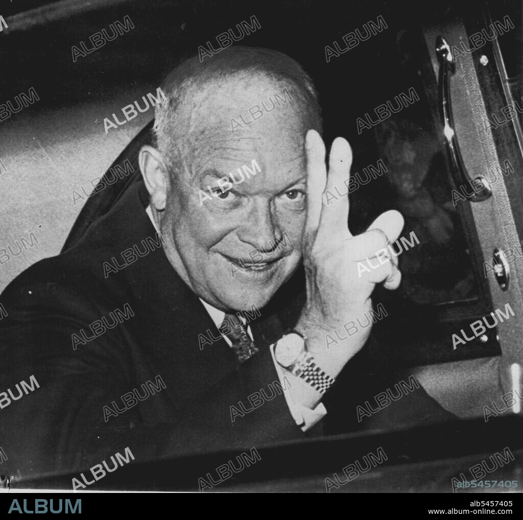 Victory V -- Gen. Dwight D. Eisenhower shows curbside crowds the wartime "V" sign as he rides from the railroad station top Gov. Thomas E. Dewey's executive mansion. Eisenhower spoke last night in nearby Troy. October 23, 1952. (Photo by AP Wirephoto).