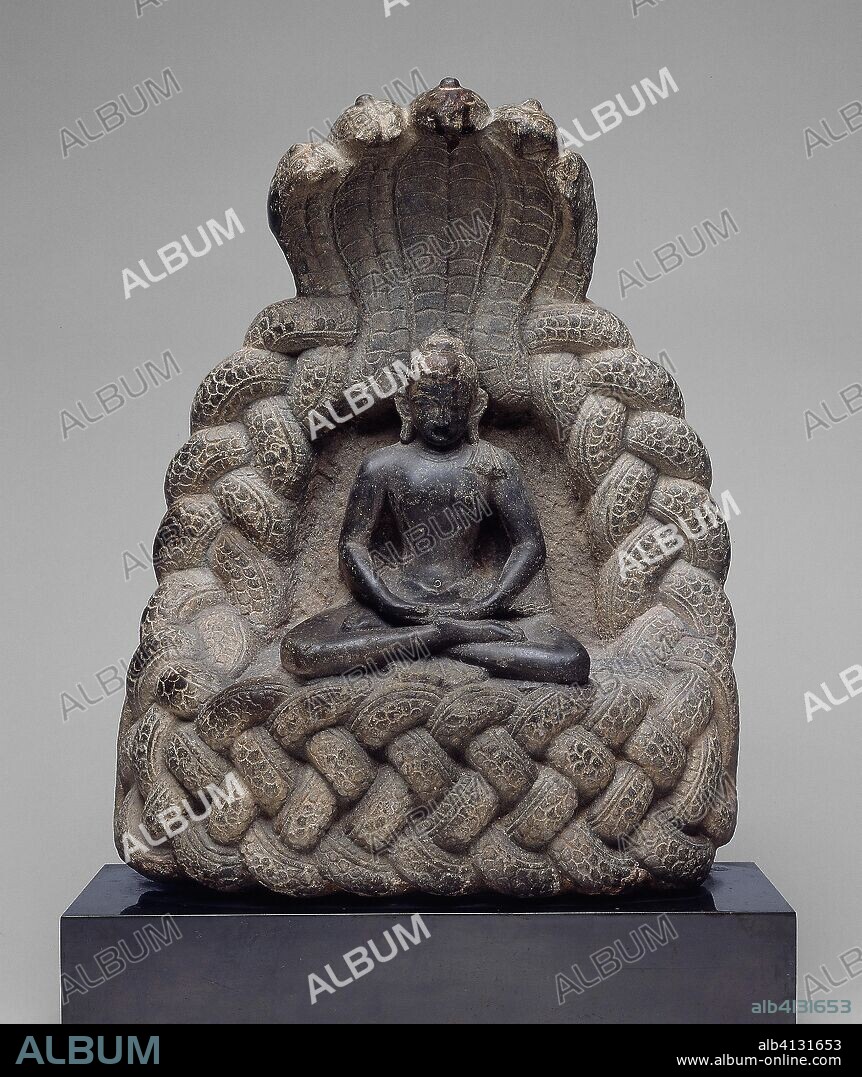 Buddha Sheltered by the Serpent King Muchalinda. Nepal; Kathmandu Valley. Date: 1001-1200. Dimensions: 44.2 x 33.5 x 14.5 cm (17 3/8 x 13 3/16 x 5 11/16 in.). Schist. Origin: Kathmandu Valley.